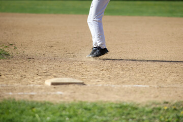 Fototapeta na wymiar baseball player leading off from first base