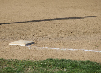 baseball base in dirt 
