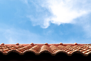 red roof and blue sky background