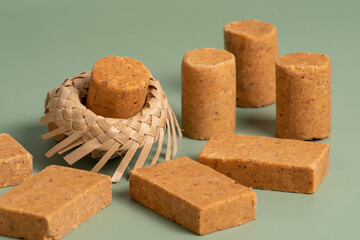Peanut candy on a green background, eat in June Parties
