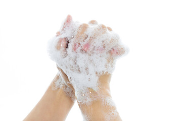 Woman rubbing fingers on white background