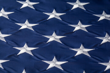 Full frame of the stars on the United States flag, close up - Powered by Adobe