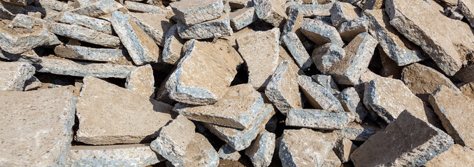 stack of stone. Old cracked road asphalt. full frame texture damaged cement stone pattern background. full frame. Industry Background