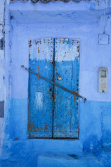 old blue door in building