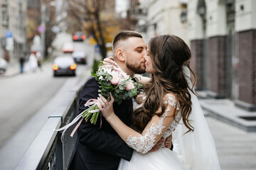 Beautiful wedding couple. Happy bride and luxurious husband.