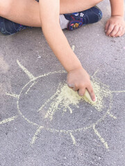 Children's drawings on the side walk with chalk. Selective focus. nature.