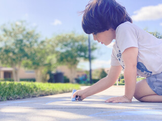 Children's drawings on the side walk with chalk. Selective focus. nature.