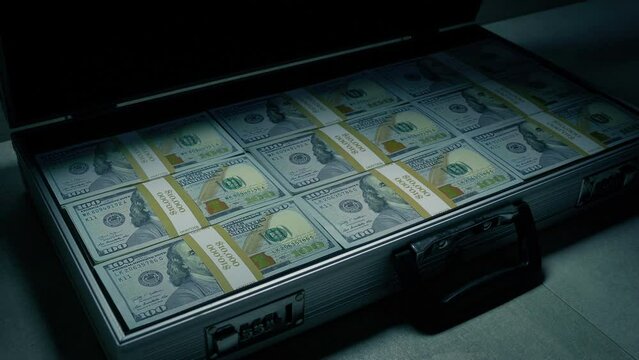 Briefcase Full Of Money Opened And Taken Away
