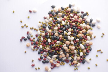  top view of mixed beans on white background 