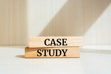 Case study text concept written on wooden blocks lying on a table