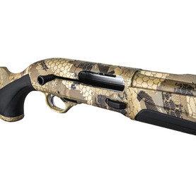 Modern semi-automatic shotgun. Weapons for sports and hunting.Rifle in camouflage coloring. Isolate on white back.