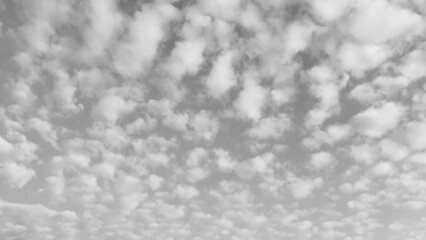 Gray sky with white clouds. Beautiful sky background and wallpaper. Concept Storm Clouds Raining.