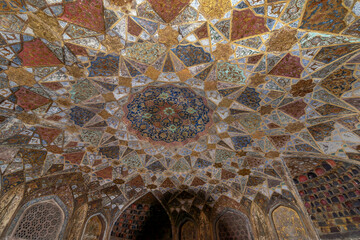 Colourful ceiling in the ancient Itimad-ud-Daulah mausoleum, also known as the Baby Taj, Agra,...