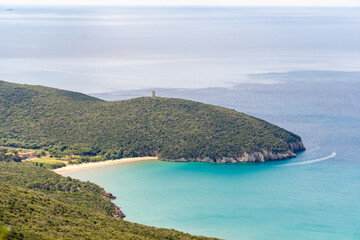 Italy Toscana Grosseto trekking at the Maremma Magliano Natural Park in Tuscany, panoramic view of the coast line, Cala di Forno and the medieval sighting tower