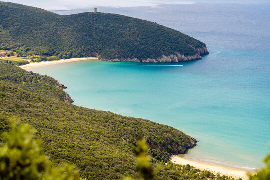 Italy Toscana Grosseto trekking at the Maremma Magliano Natural Park in Tuscany, panoramic view of the coast line, Cala di Forno and the medieval sighting tower