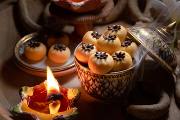 Close up view of several Thai traditional desserts served on porcelain in wooden tray