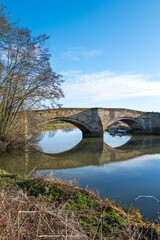 Old stone bridge between Elvington and Sutton upon Derwent near York, England