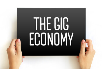 The Gig Economy text on card, concept background