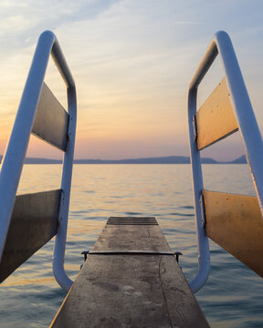 a diving board at the beach in Cres