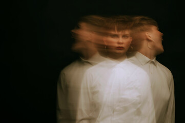 portrait of a psychopathic woman with mental disorders and spiritual diseases on a dark background