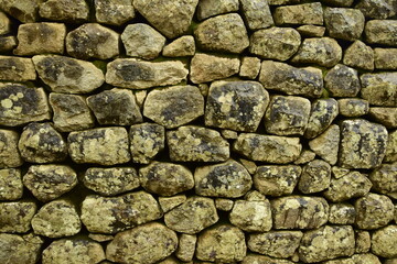 Inca wall in the village Machu-Picchu close-up, Peru, South America