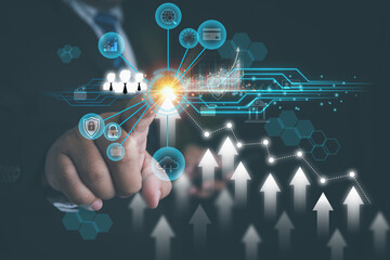 Financial, Investment, and Business concept. Businessman draws increase arrow of graph growth for analysis growth graph chart of corporate business. Plan strategy for investment in the future.