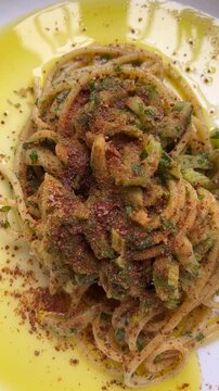 Spaghetti with bottarga and celery. Top view