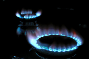 gas burner with burning gas. dark background