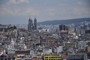 Aerial cityscape of the historic city center of Quito with the Compania de Jesus church dome