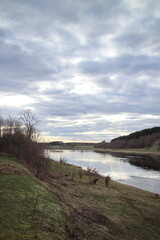 Sunset on the river in the countryside in spring