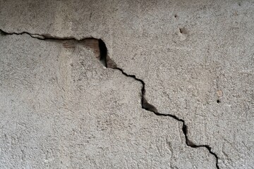 cracked plaster on the wall background,texture
