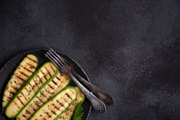 Grilled zucchini with herbs, healthy vegetable meal
