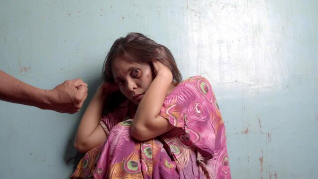 Terrified Filipina Woman Being Abused. Handheld