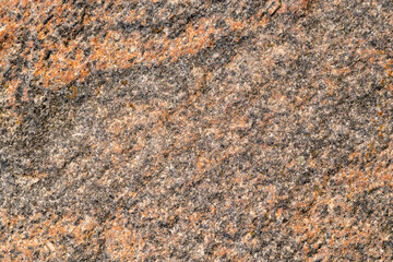 Granite stone wall texture pattern of natural mineral rock background