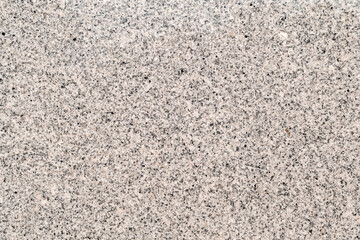 Granite stone wall texture pattern of natural mineral rock background
