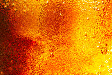 macro cola texture,cola with ice food background, cola close-up, design element. beer macro bubbles, ice, bubble, background, ice cubes, abstract backgrounds
