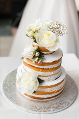 Multi level wedding cake with flowers