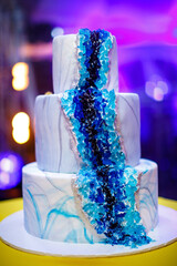Multi level wedding cake on the table