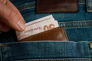 the person who wants to take the wallet full of money in his jeans pocket