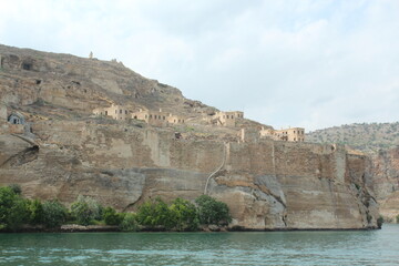 Halfeti Greek Castle, also known as "Hidden Paradise" and "Lost City" with its stone architecture under the Euphrates River, the sunken minaret and the surrounding landscape. Halfeti Şanlıurfa Turkey