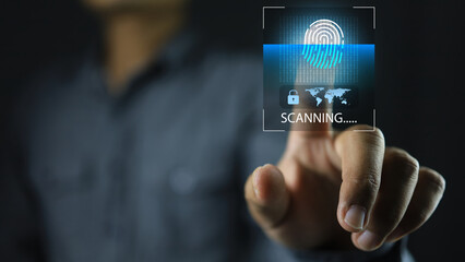 A man is touch click press his finger to scan to sign in. Login to computer network information to connect to the online world of big data or mobile banking cyber security concept ISO 27001, 27002.
