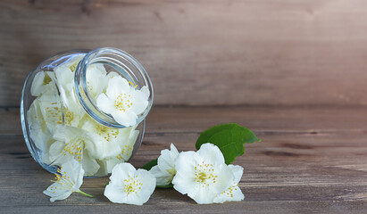 Obraz na płótnie Canvas Jasmine flowers are collected in a jar