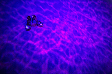 Wedding shoes on a colorful background