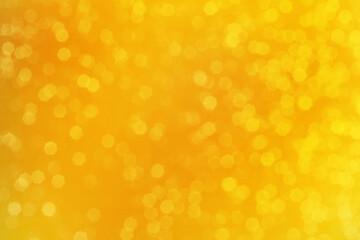 Bright yellow sparkling glitter bokeh background, abstract defocused lights texture