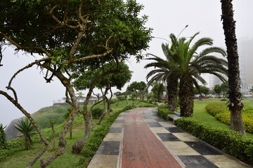 Obraz premium Miraflores Town landscapes. Park on the coast of Lima in the fog, in the Miraflores district, Peru