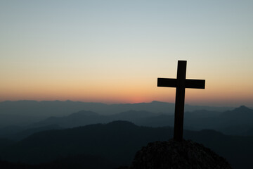The crucifixion of Jesus Christ at the sunrise - Silhouette Three Crosses On Hill