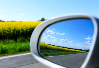 Nature view over car mirror