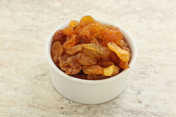 Sweet yellow raisin in the bowl