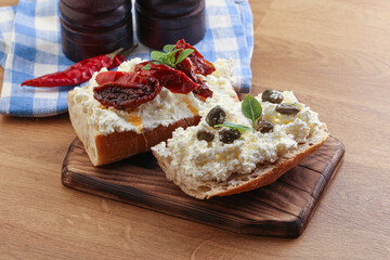 bruschetta with soft cheese capers and tomato