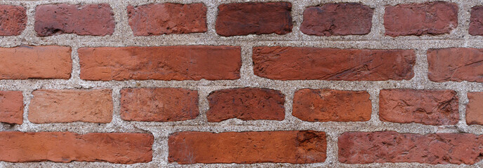 Texture of red bricks. Banner with a red brick pattern